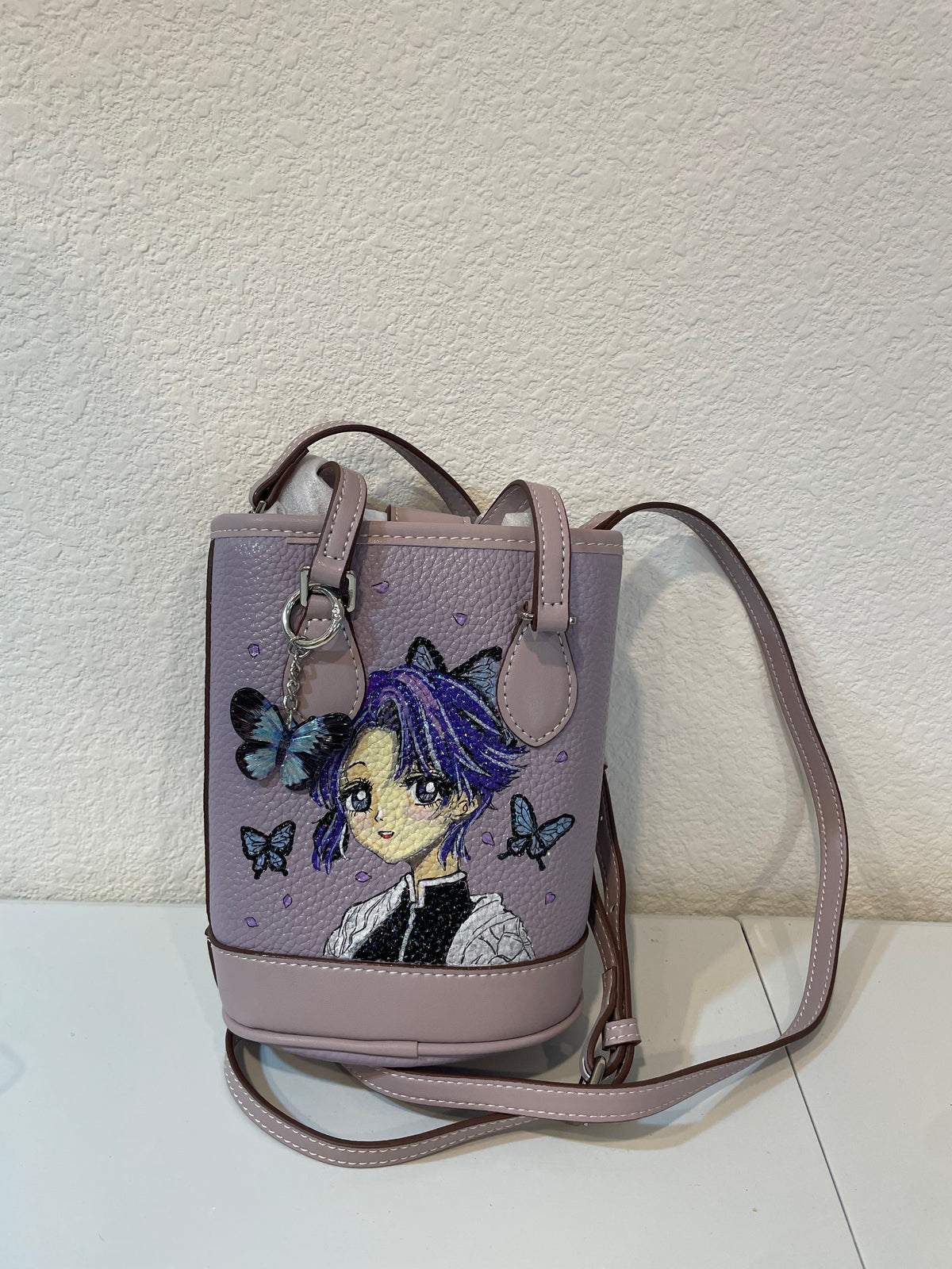 Shinobu x Butterflies leather bucket bag