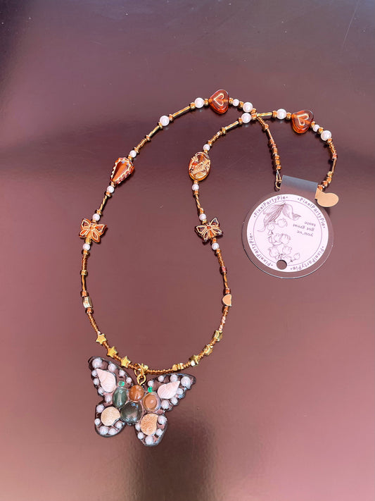 Butterfly sweater necklace 24 inches Gold & Blk