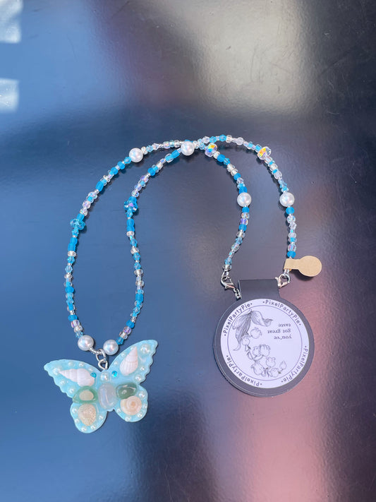 Butterfly sweater necklace 24 inches blue