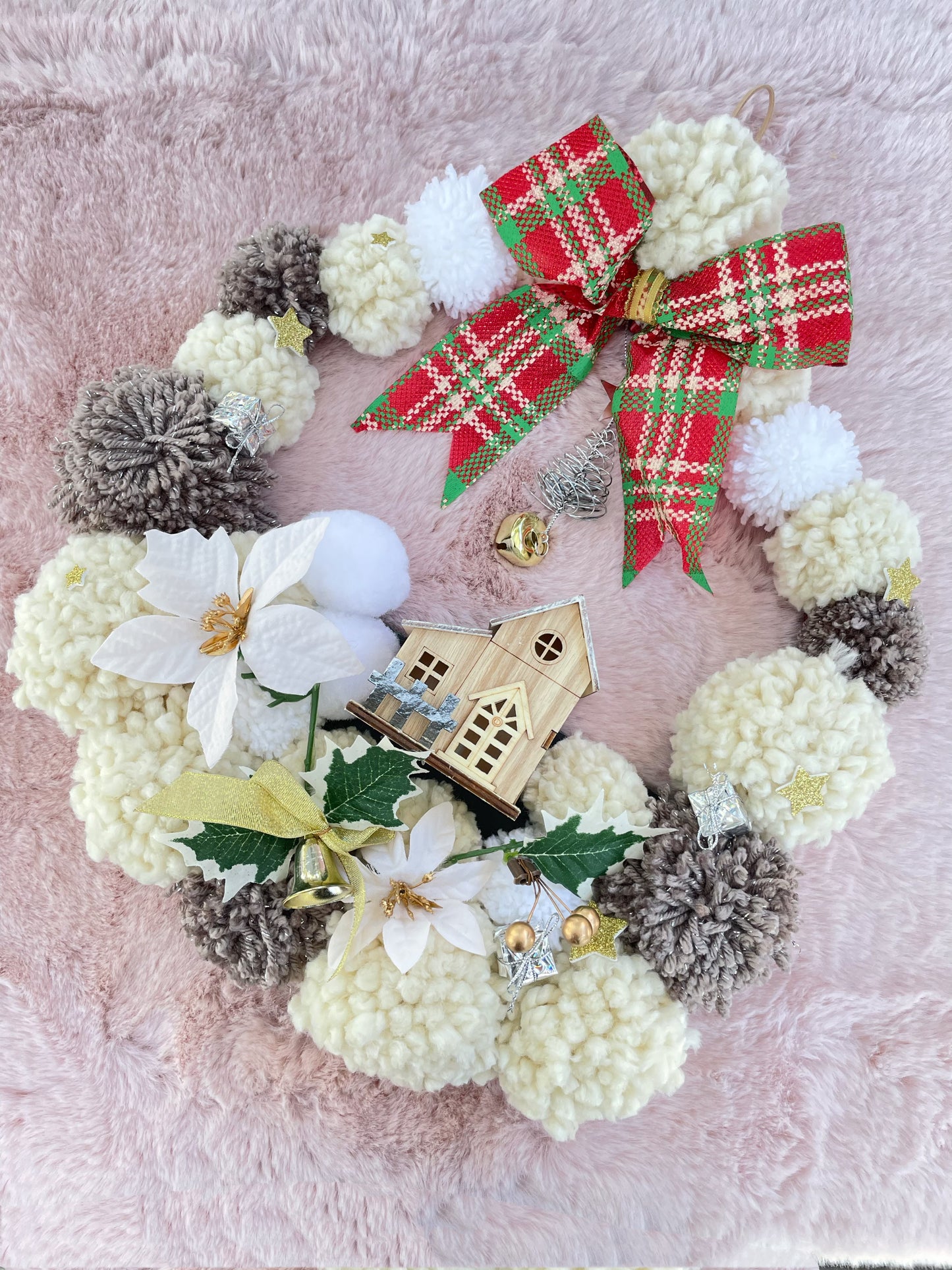 House lighting up Door Wreath